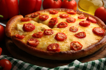 Pizza Margherita, removed slice and vegetables, close-up