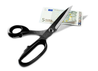 Scissors cut euro banknote, isolated on white