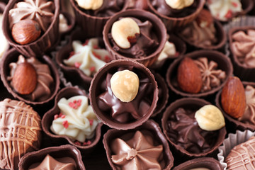 Delicious chocolate candies background, close up