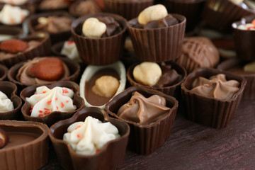 Delicious chocolate candies background, close up