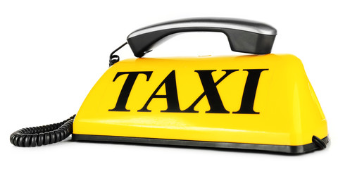 Transportation concept. Yellow taxi sign with grey receiver isolated on white background, close up