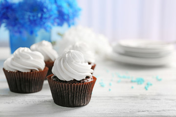 Cupcakes on wooden table