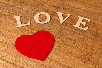 Valentine hearts on rustic wooden background