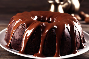 Chocolate cake on a wooden tale
