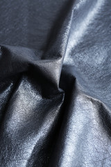 Fototapeta premium Black wrinkled leather texture background