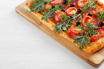 Part of rectangle delicious pizza, isolated on white