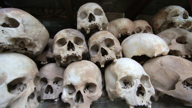 Skulls and bones in Killing field, cambodia, moving camera