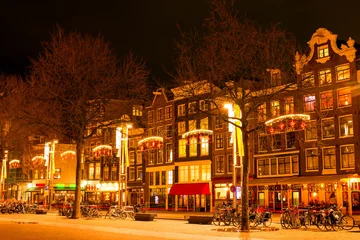 Gordijnen Amsterdam at night in christmas time in the Netherlands © Nataraj