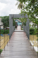 The wooden hanging bridge , mangrove