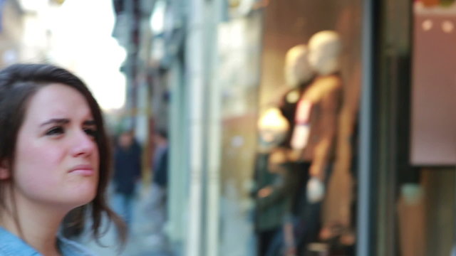 Young woman window shopping