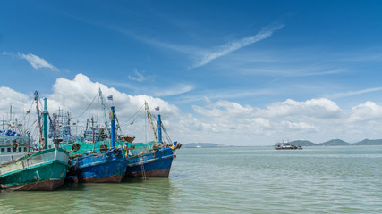 Obraz premium Thai wooden fishing boats in harbor, Thailand