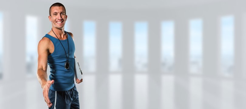 Composite image of happy personal trainer giving handshake