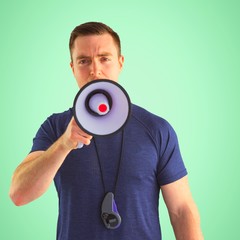 Composite image of male trainer yelling through the megaphone