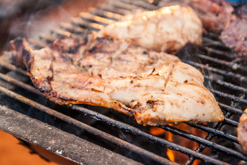 grilled pork on the flaming