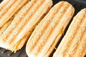 Homemade paninis on grill