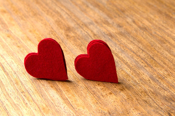 Valentine hearts on rustic wooden background