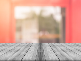 Wooden board empty table in front of blurred background. Perspective grey wood over blur in coffee shop - can be used for display or montage your products.Mock up for display product.Vintage filter.