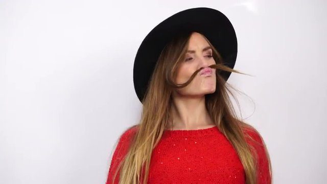 Woman in hat with hair mustache having fun 4K.