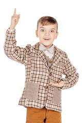 Portrait adorable young happy boy looking at camera isolated on