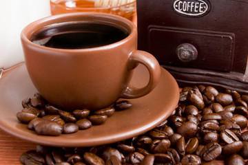 Coffee beans and hand-mill for grinding