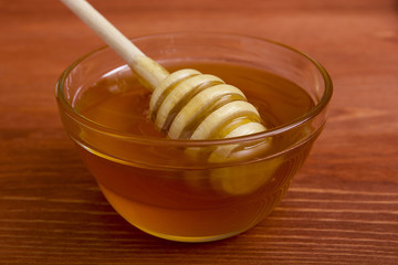 Wooden honey stick to extract honey