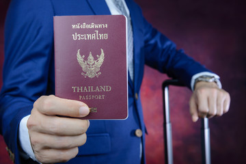 businessman showing passport, travel aboard, business trip