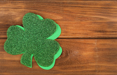 Shamrock. Clover leaves on wood background. St. Patrick's Day