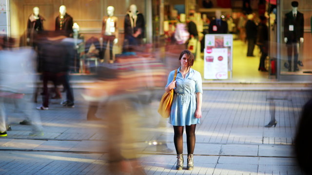 Girl in front of shopping mall, timelapse, 4K