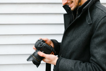 Photographer on walk with a professional camera