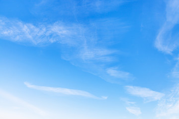 cirrus white clouds in blue sky in winter