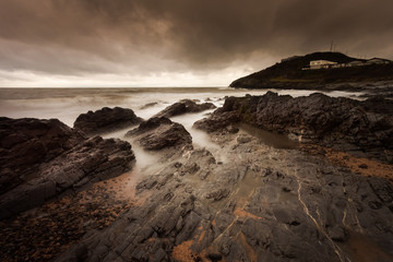 Obraz premium Stormy Bracelet Bay Blue Flag and Seaside Award winning Bracelet Bay beach is just around Mumbles' head on the Gower peninsula in South Wales. 