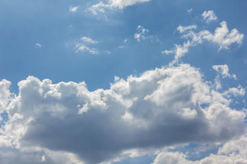 Fototapeta na wymiar Beautiful light blue sky with puffy white clouds