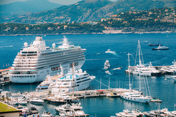 White Yachts and Ships Of Different Sizes Are Moored At City Pie