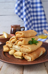 Pancakes with curd on a large plate