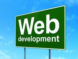 Web development concept: Web Development on road sign background