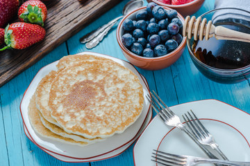 Pancakes for breakfast with berry fruits