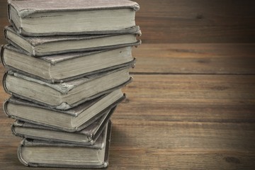 Old Shabby Books In Stack On The Wood Horizontal Background