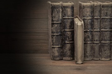 Six Old Shabby Books With Black Leather Cover Horizontal Backgro