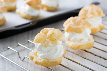 Fresh profiteroles with cream
