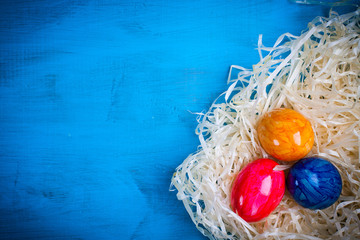 Easter eggs on hay.