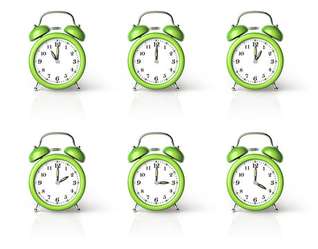 Green ringing alarm clock isolated on white background