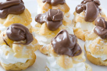 Fresh profiteroles with cream
