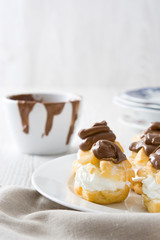 Fresh profiteroles with cream
