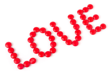 word love from red sweets isolated on white