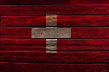Flag of Switzerland on wood