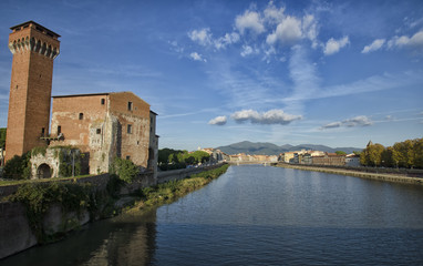 Fototapeta na wymiar Pisa from a bridge over Arno river
