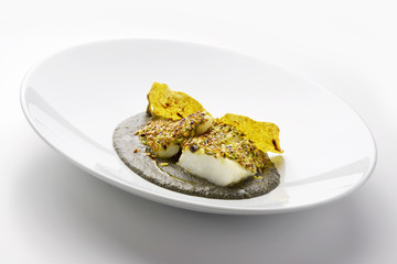 Salt cod crusted with pistachios and black polenta