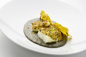 Salt cod crusted with pistachios and black polenta