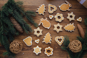 Christmas cookies lying on the table with presents