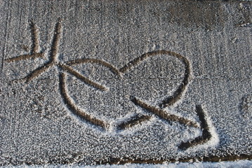 Heart pierced by an arrow of Cupid